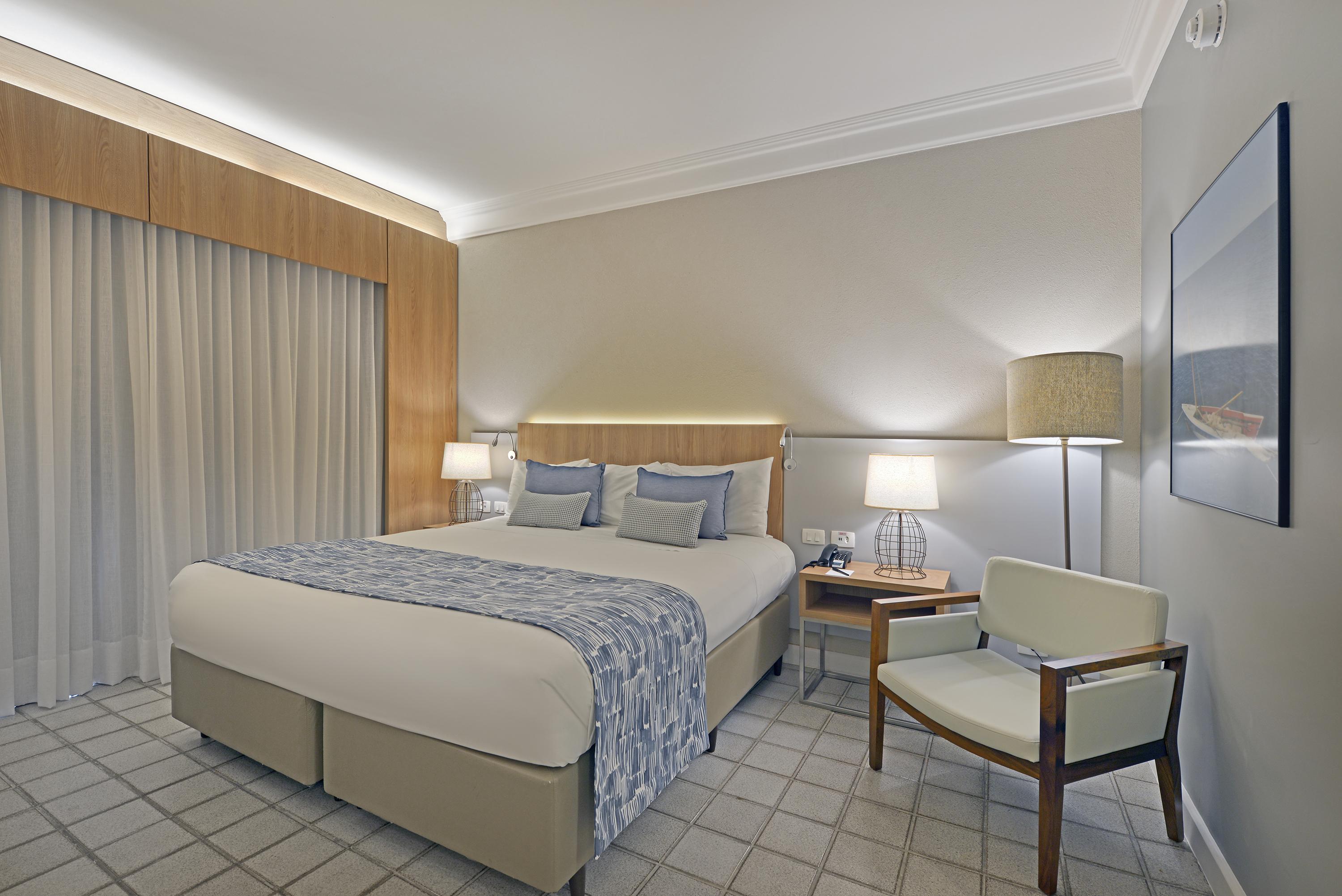 ホテル デヴィレ プライム サルバドール エクステリア 写真 A bedroom in the new hotel